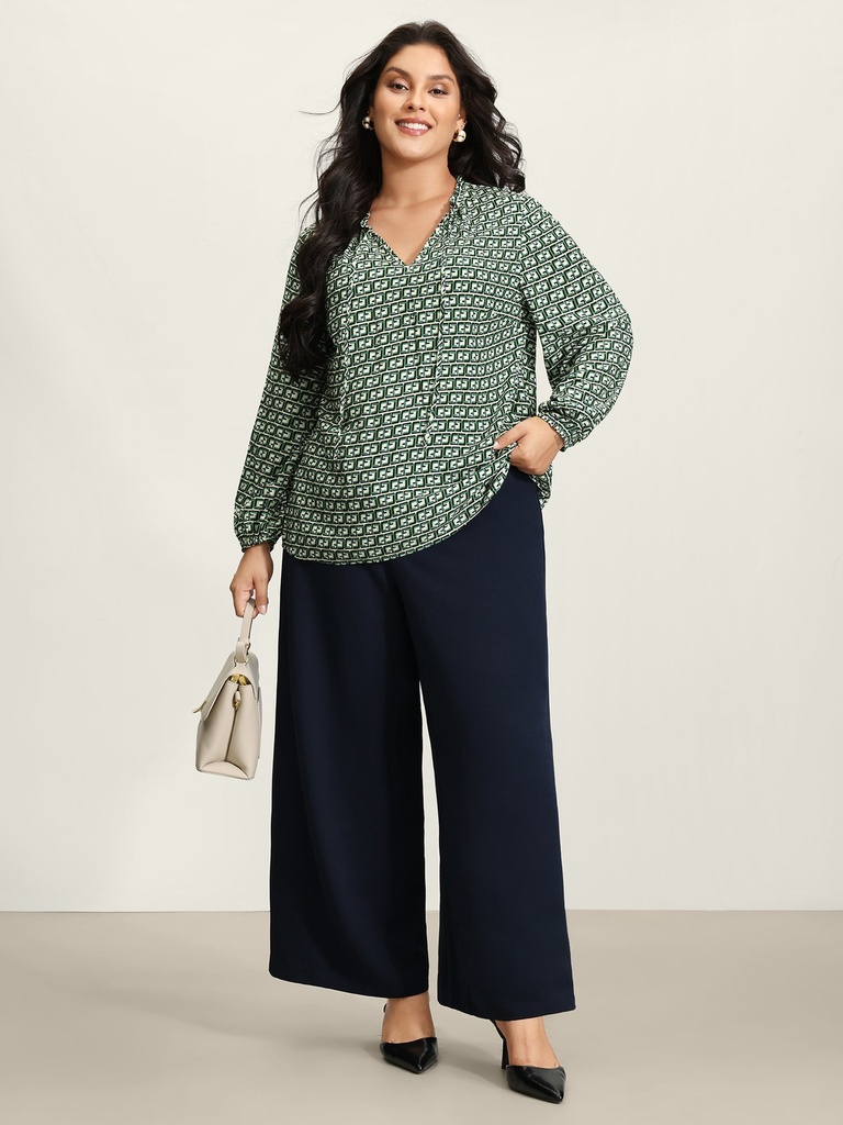 Blusa estampada con mangas abullonadas