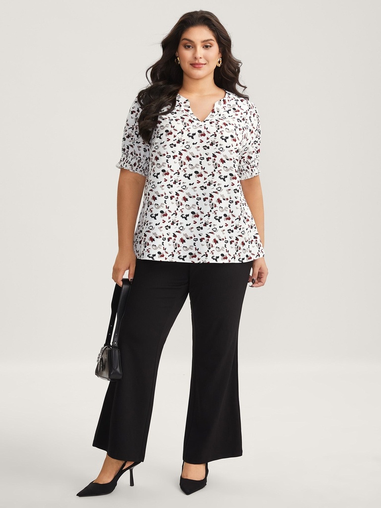 Blusa con cuello en V animal print