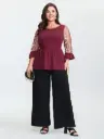 Blusa de punto con mangas tejidas