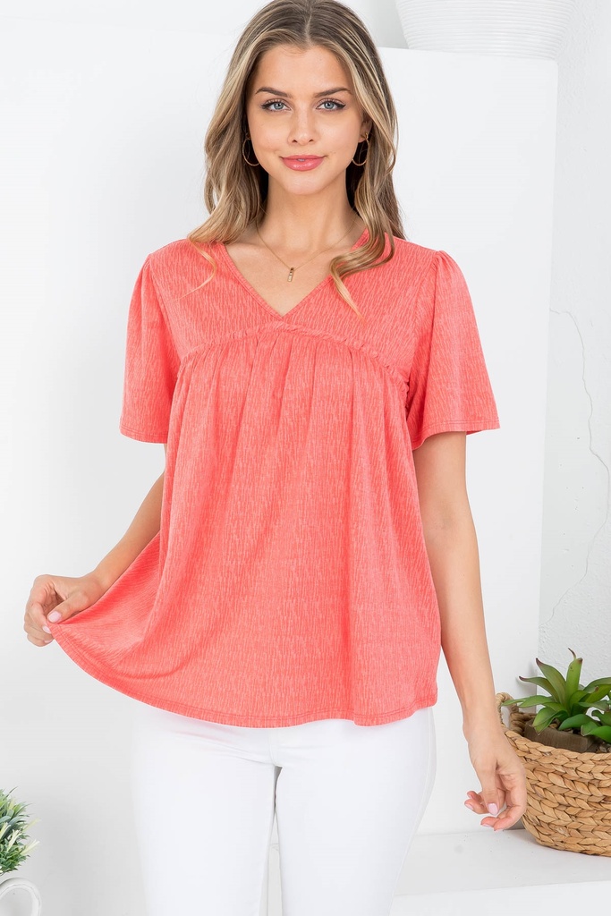 Blusa plisada con manga corta