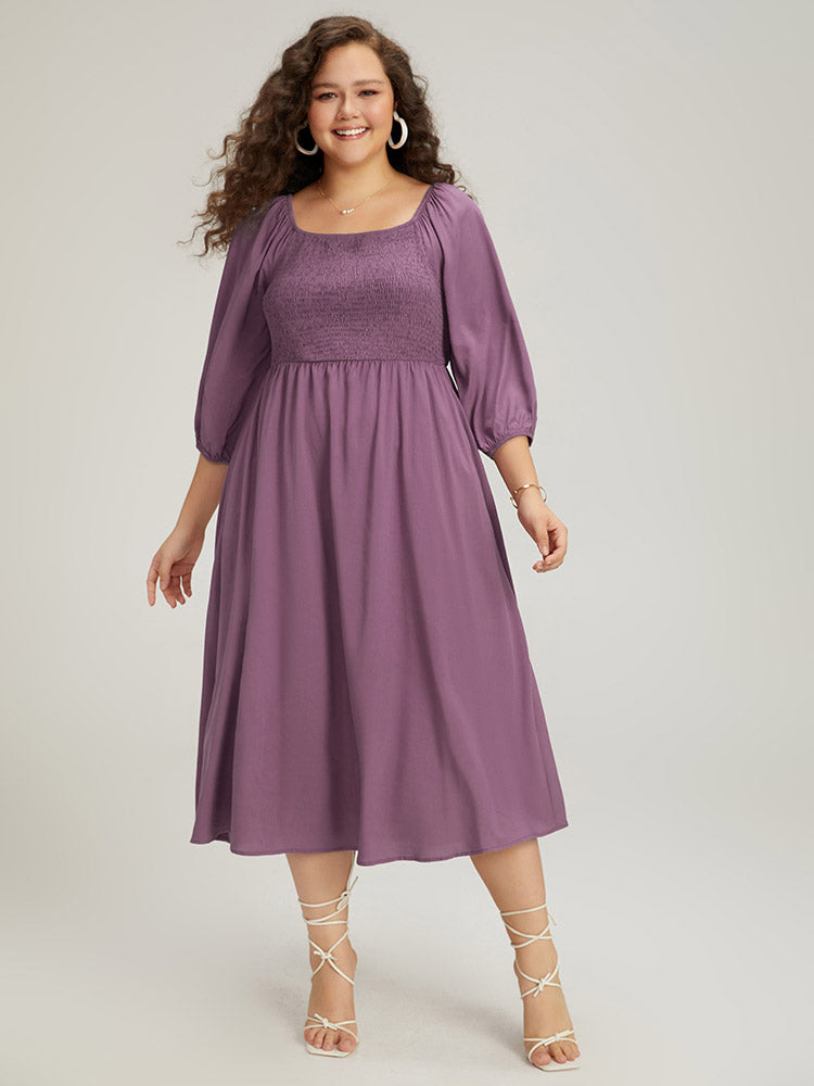 Vestido midi de corpiño fruncido