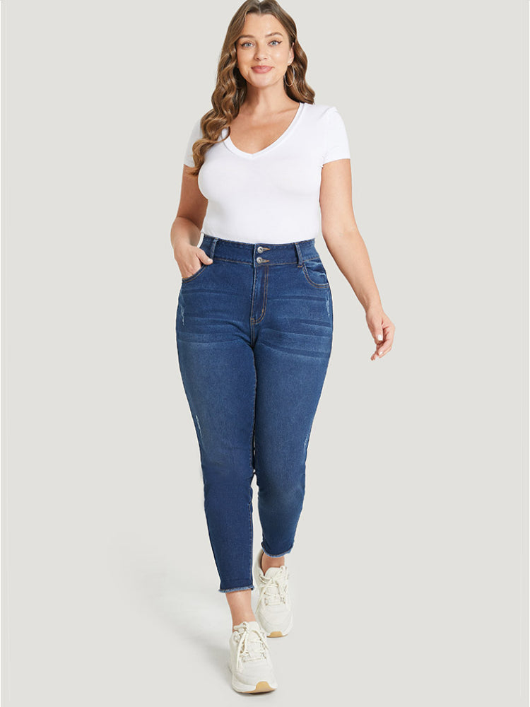 Jeans elásticos con detalle desgastado
