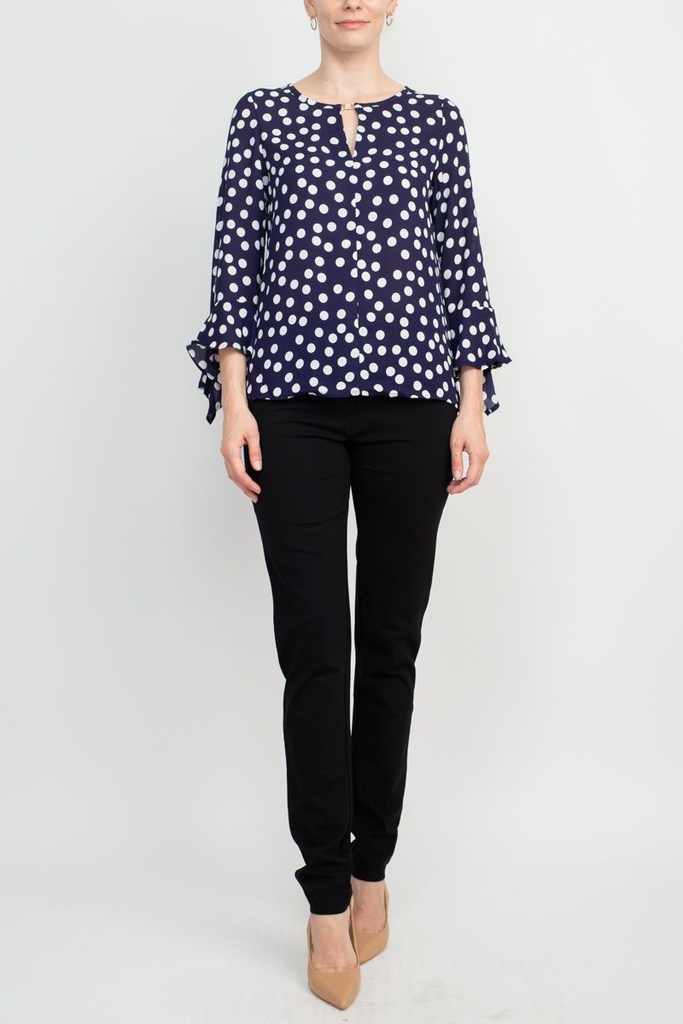 Blusa de puntos con ojo de cerradura