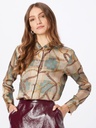 Blusa con estampado de cinturón