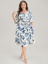 Vestido floral con nudo al frente 