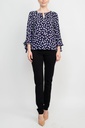 Blusa de puntos con ojo de cerradura