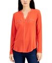 Blusa jersey  bolsillos con cremallera