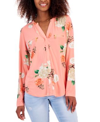 Blusa con bolsillos de cremallera