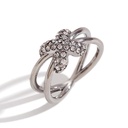 Anillo cruzado con brillos