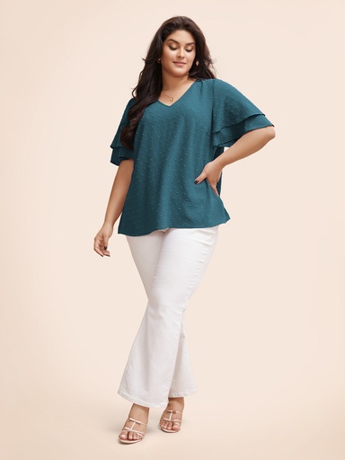 Blusa de lunares con escote en V