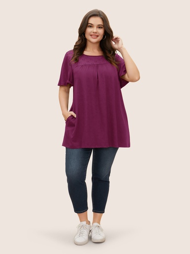 Blusa con bolsillos laterales