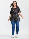 Blusa de espalda cruzada y estampado floral 