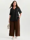 Blusa plisada con cremallera frontal